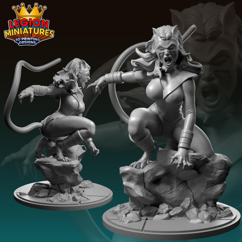 two 3D printed figurines of a female character, one in a crouching position and the other standing on a rock.