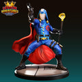 A 3D printed figurine of a superhero character in a blue suit, holding a gun and a golden staff, standing on a platform.