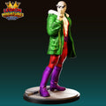A 3D printed figurine of a person wearing a green jacket, red pants, and purple boots, standing on a platform.