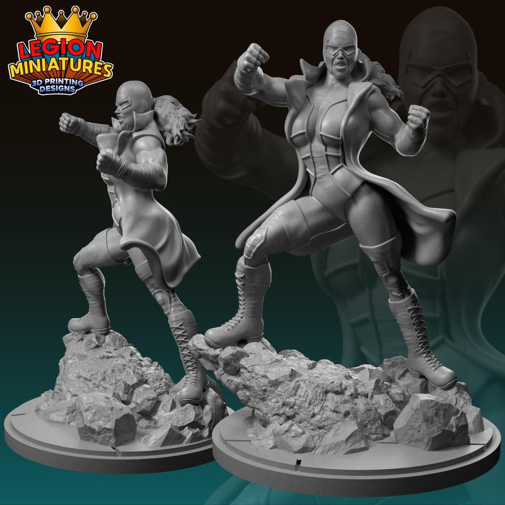 two 3D printed miniatures of female characters, one standing and one in a fighting stance, both wearing protective gear.